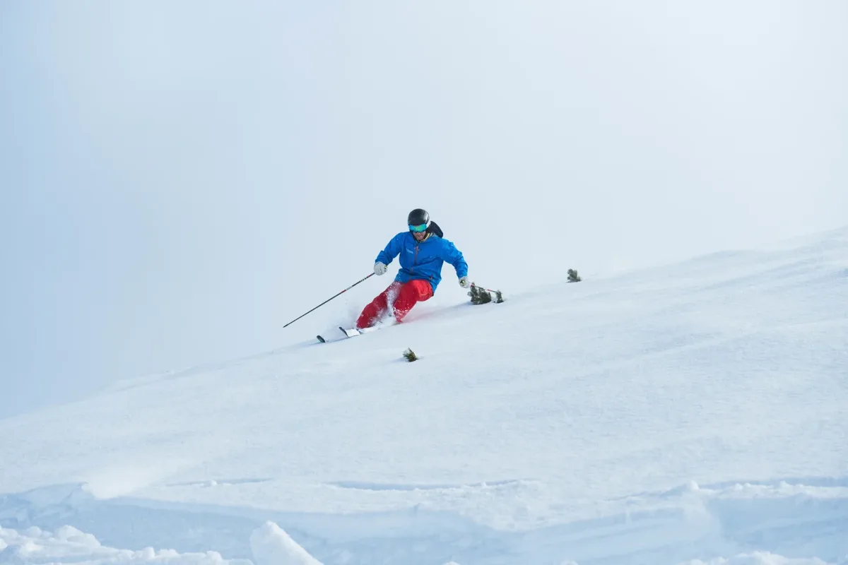 skier on a snowy slope in Kufri